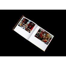 Afbeelding in Gallery-weergave laden, Opengeslagen boek A Sense of Place met twee kleurenfoto's
